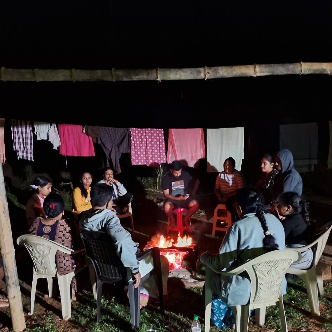 Guests enjoying bonfire evening at ibbanithota Samse homestay